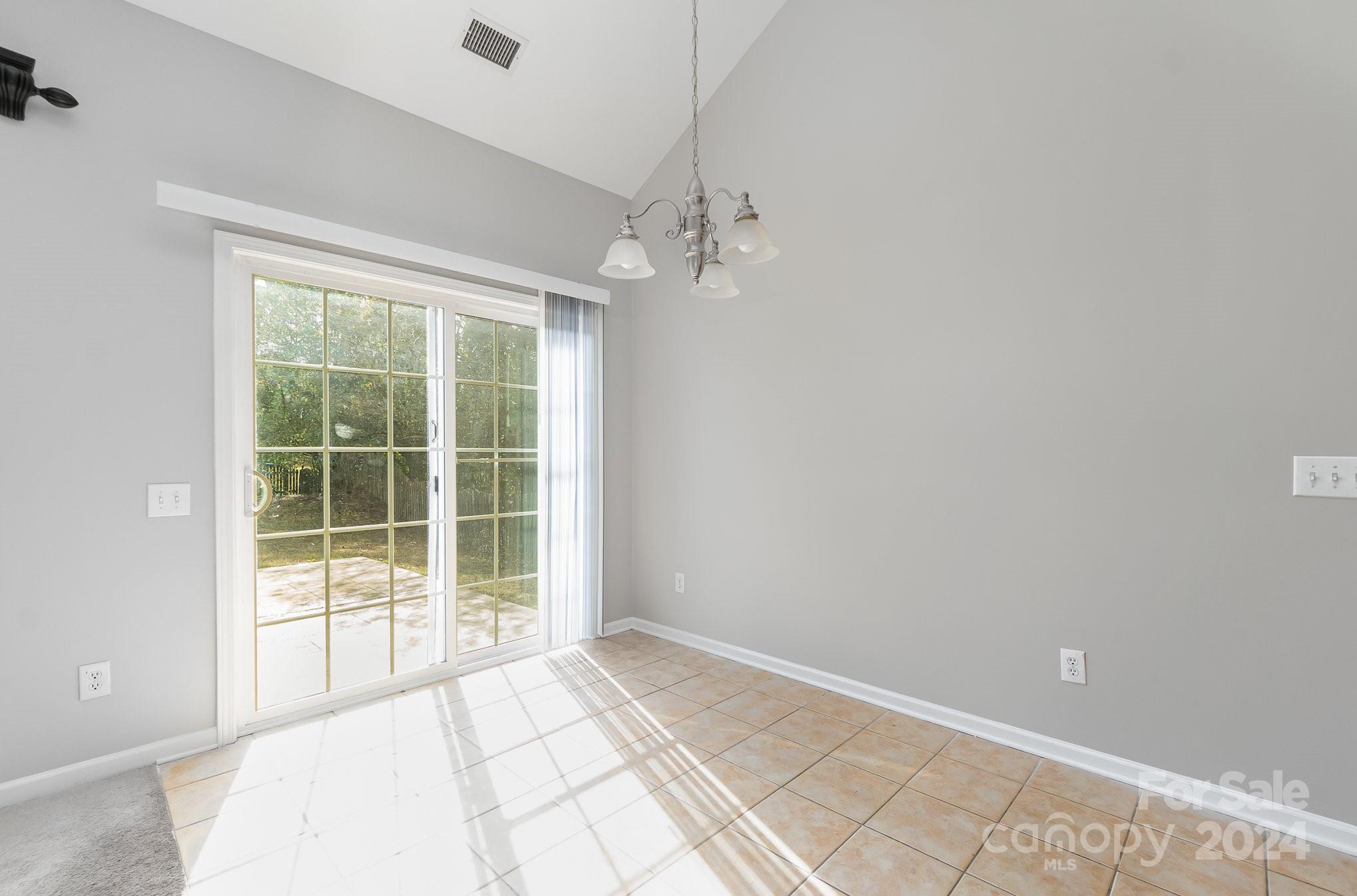 2532 Coltsgate Road Waxhaw, NC 28173 - Photo 6 of 21 en empty room with windows