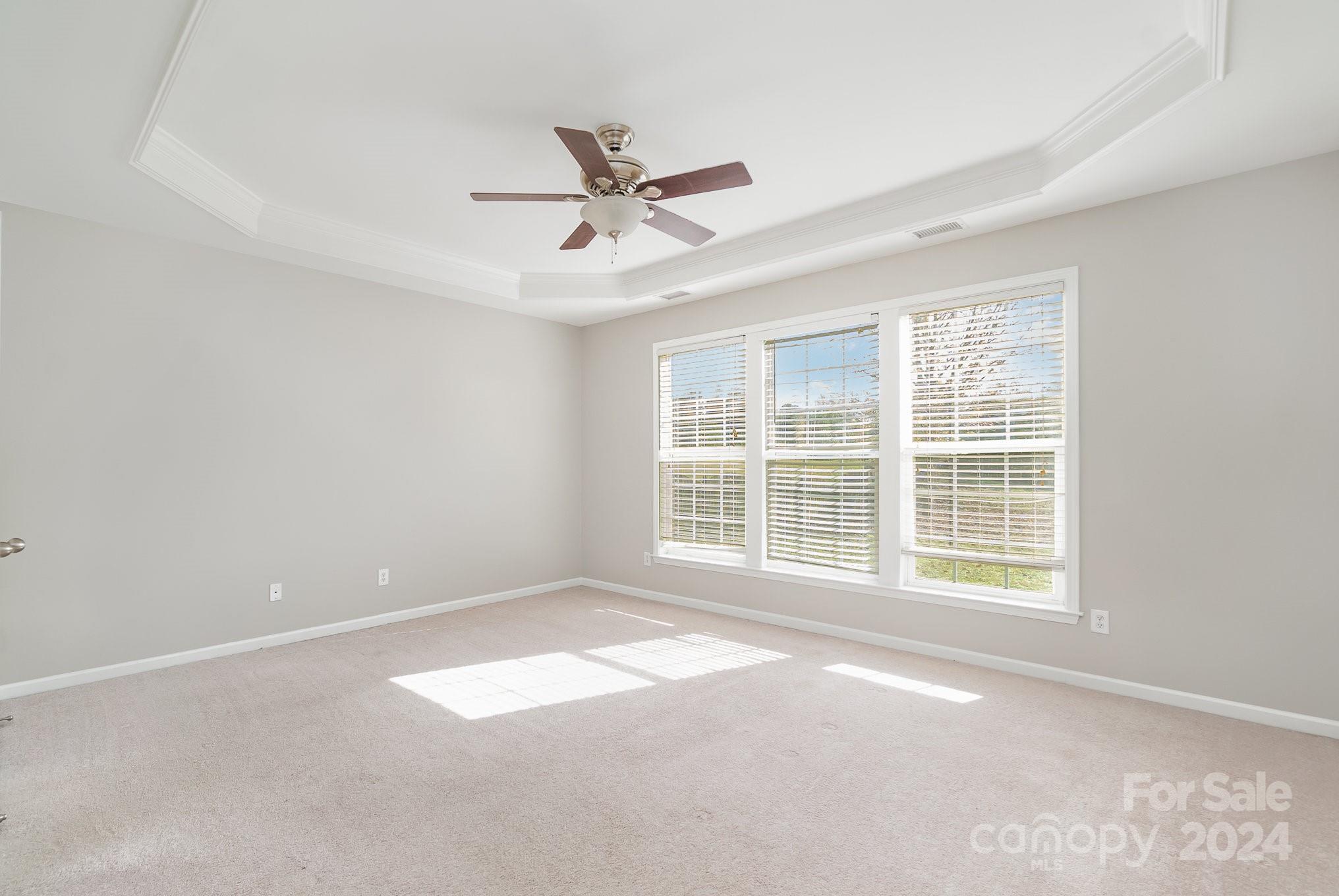 2532 Coltsgate Road Waxhaw, NC 28173 - Photo 10 of 21 a view of an empty room with a window