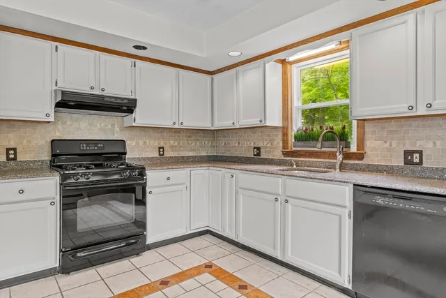a view of empty room with ceiling fan