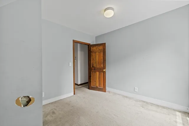 a view of a room with a window