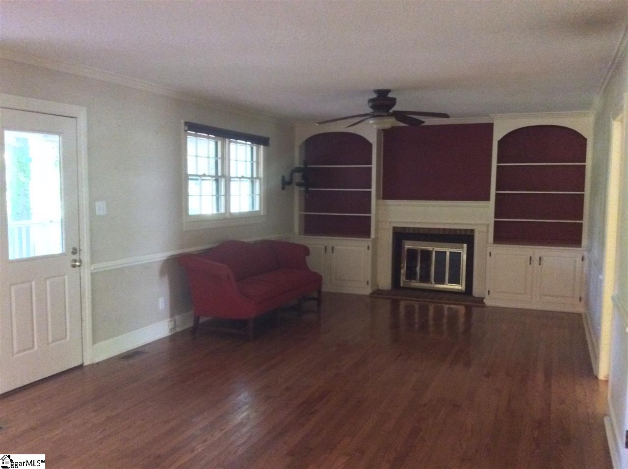 103 Bagwell Farm Road Spartanburg, SC 29302 - Photo 10 of 32 Great room contains built in bookcases, two closets, eating area and pass through from the kitchen.