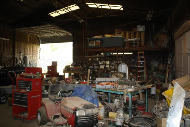a room with furniture a flat screen tv and a fireplace