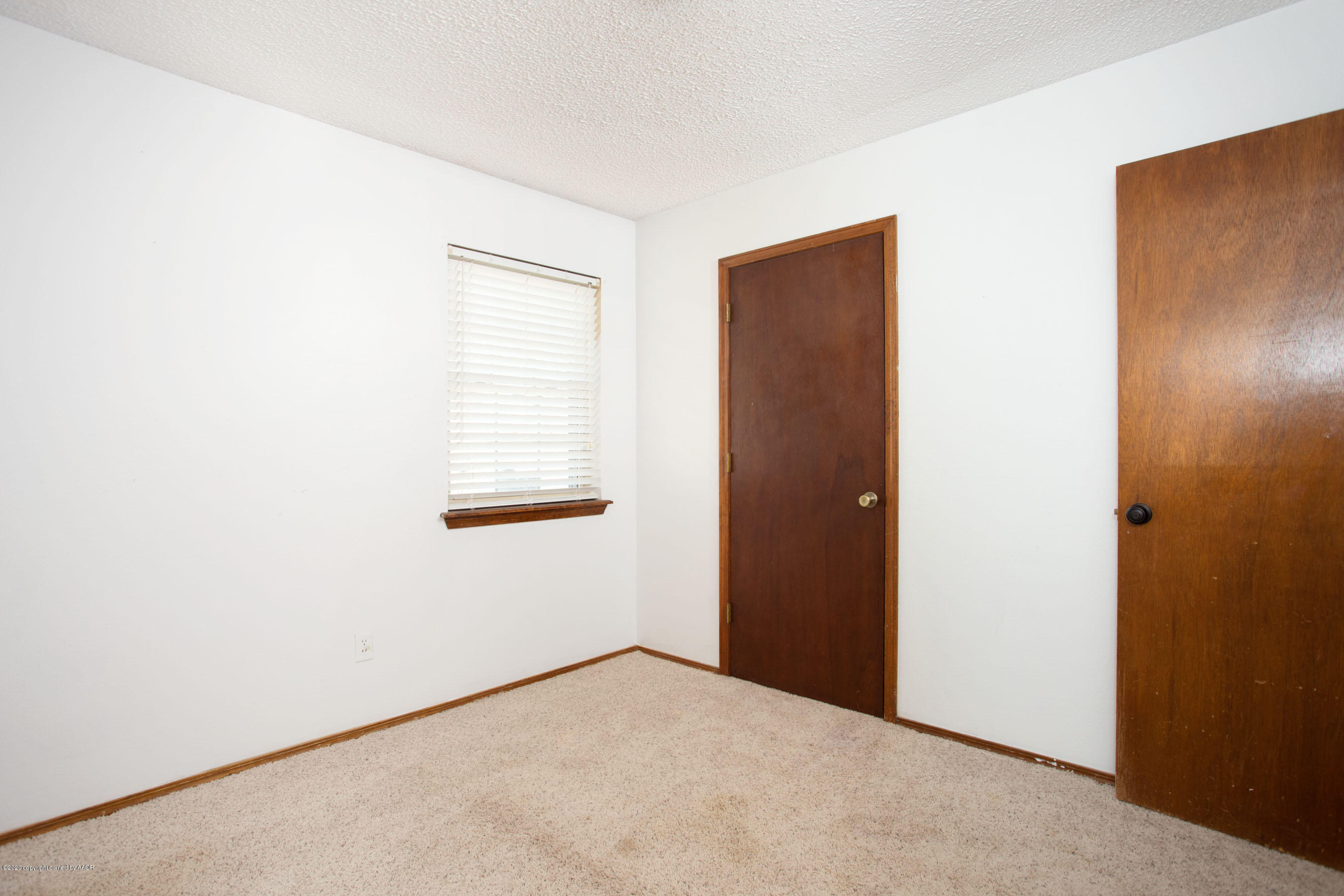 8213 Wrangler Trail Amarillo, TX 79110 - Photo 15 of 20 a view of an empty room with a window