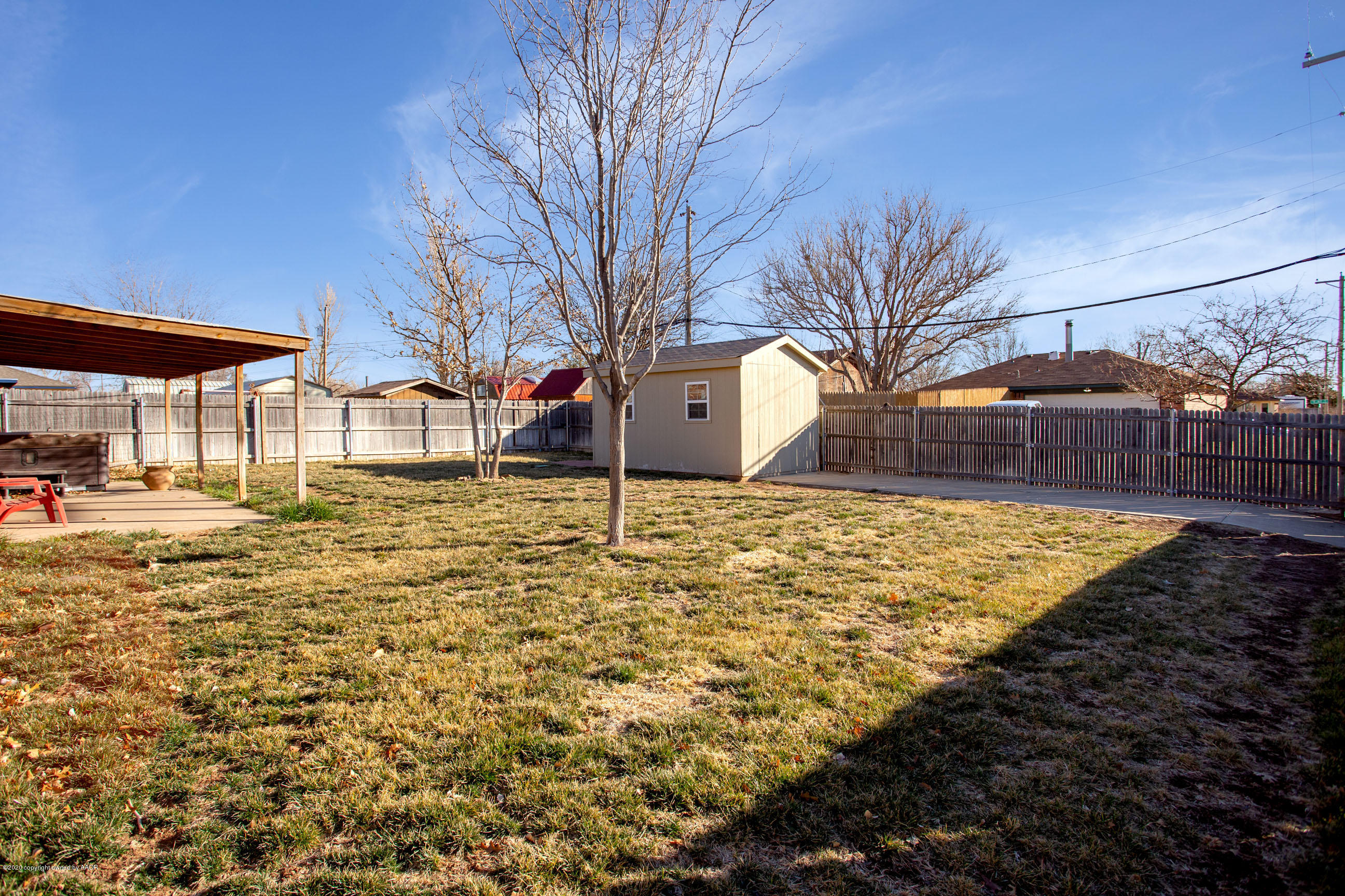 8213 Wrangler Trail Amarillo, TX 79110 - Photo 17 of 20 a view of yard with outdoor seating