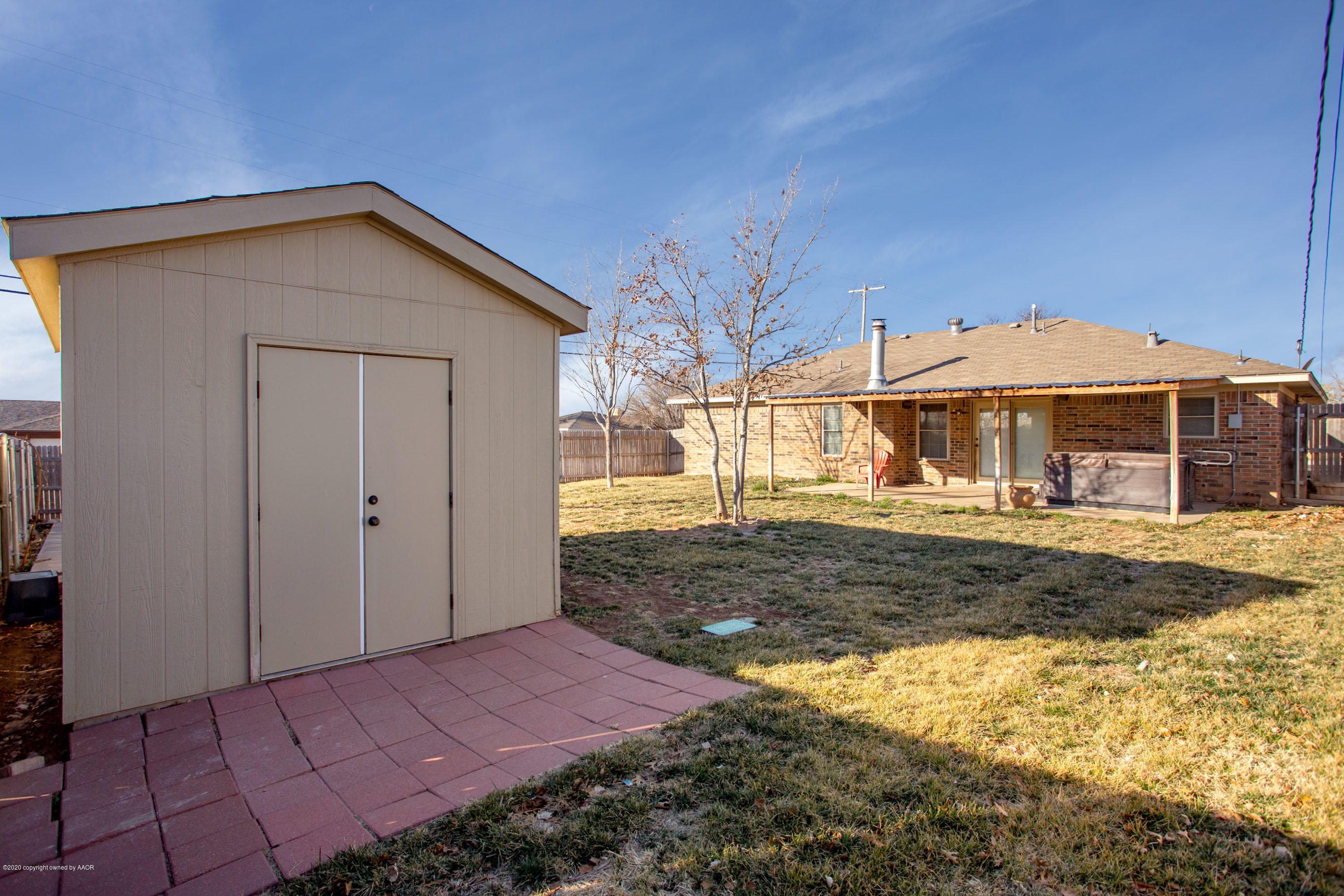 8213 Wrangler Trail Amarillo, TX 79110 - Photo 20 of 20 a view of a house with a yard