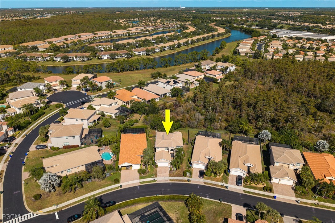 10117 Silver Maple Court Fort Myers, FL 33913 - Photo 36 of 49 an aerial view of residential houses with outdoor space