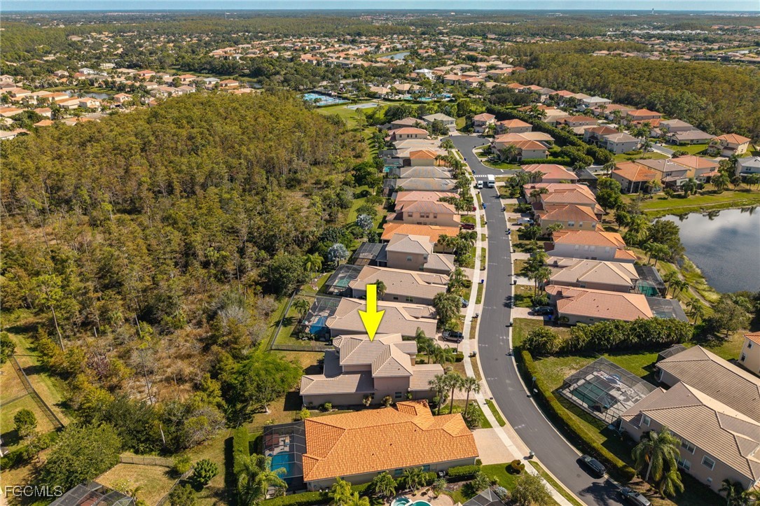 10117 Silver Maple Court Fort Myers, FL 33913 - Photo 37 of 49 an aerial view of residential houses with outdoor space
