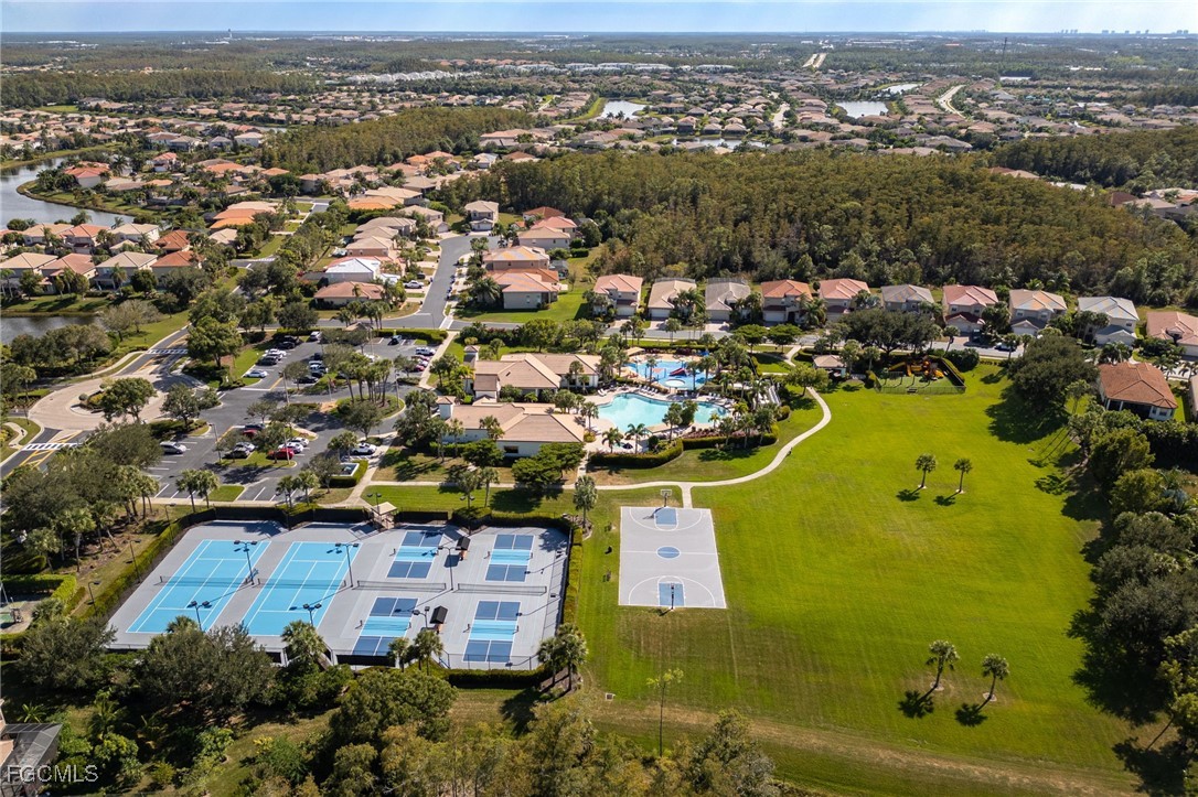 10117 Silver Maple Court Fort Myers, FL 33913 - Photo 45 of 49 an aerial view of residential building with parking space