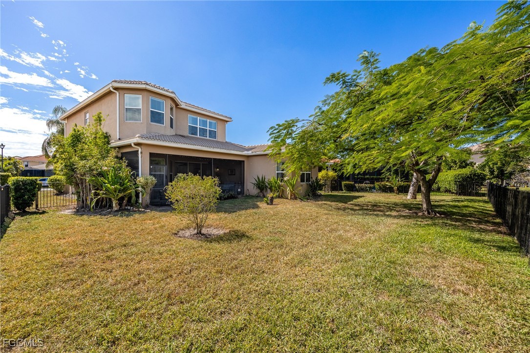 10117 Silver Maple Court Fort Myers, FL 33913 - Photo 8 of 49 a bathroom with a sink and mirror
