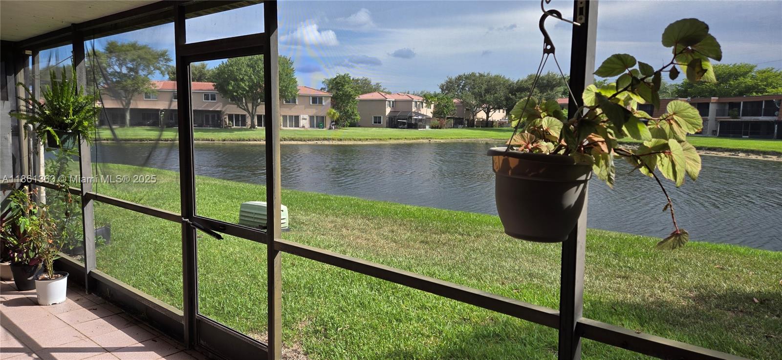 11034 Southwest 15th Manor, Unit X Davie, FL 33324 - Photo 5 of 5 a view of lake from a balcony