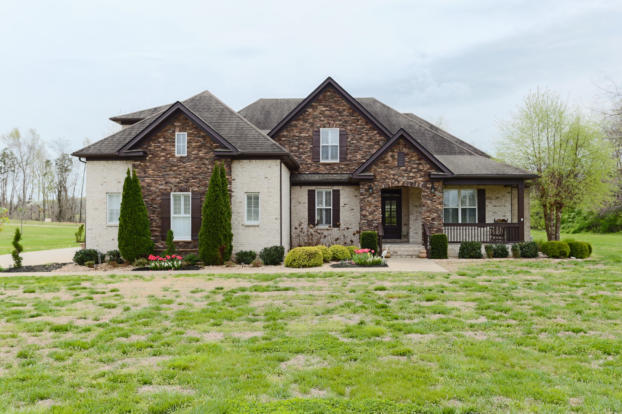 1700 Zevon Court Spring Hill, TN 37174 - Photo 1 of 71 a front view of a house with a yard