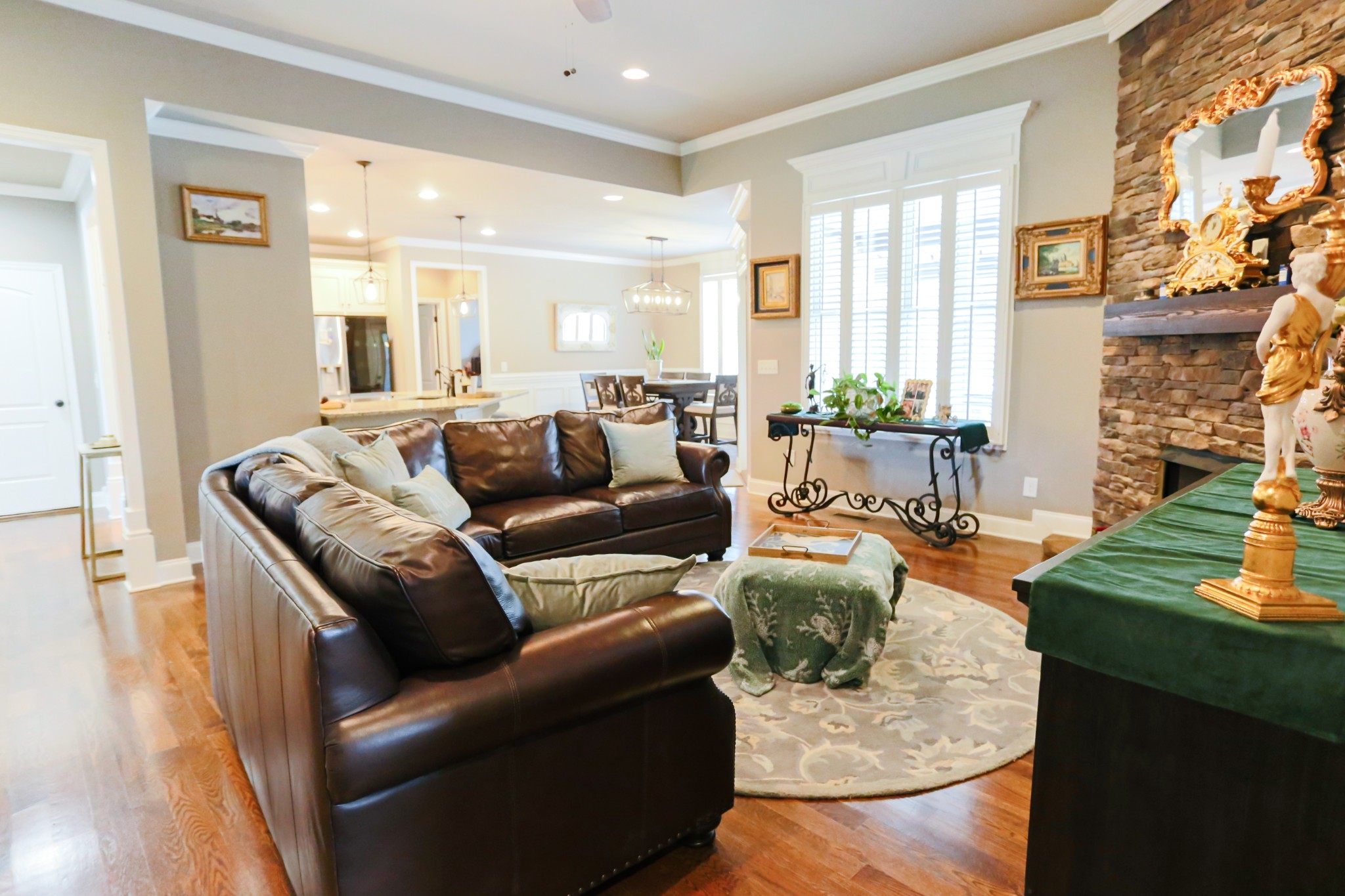 1700 Zevon Court Spring Hill, TN 37174 - Photo 15 of 71 a living room with fireplace furniture and a large window