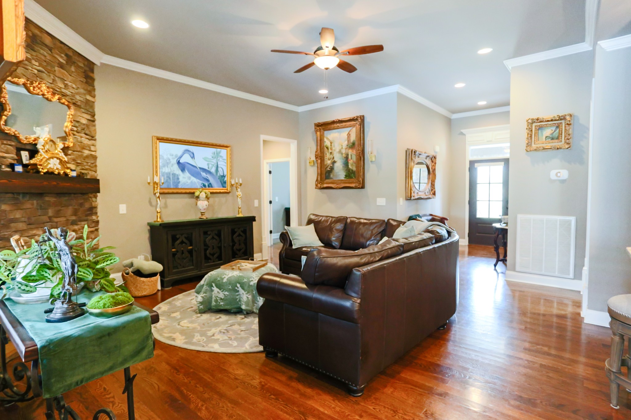 1700 Zevon Court Spring Hill, TN 37174 - Photo 17 of 71 a living room with furniture and a fireplace