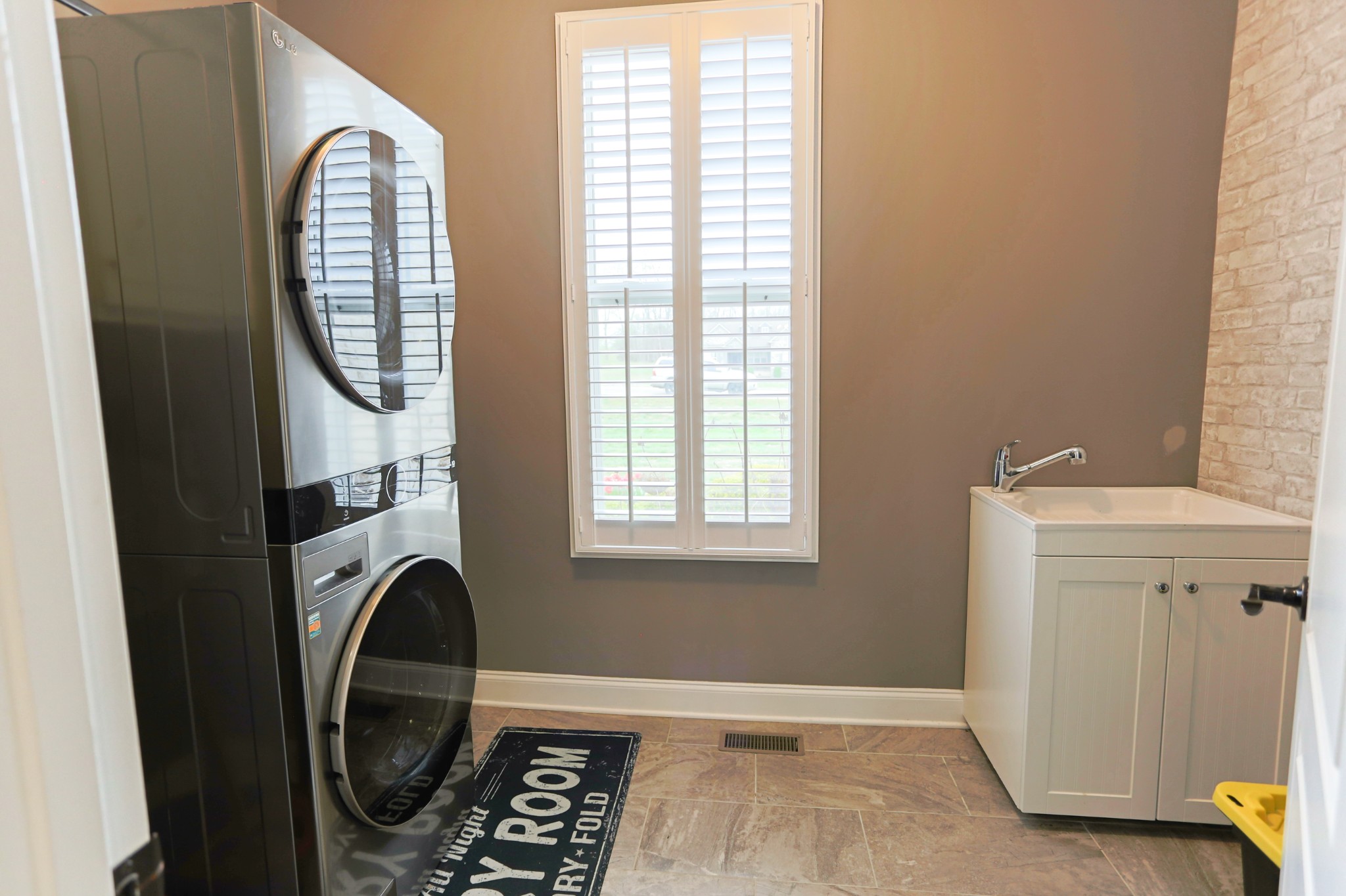 1700 Zevon Court Spring Hill, TN 37174 - Photo 26 of 71 a view of a storage and utility room with washer and dryer