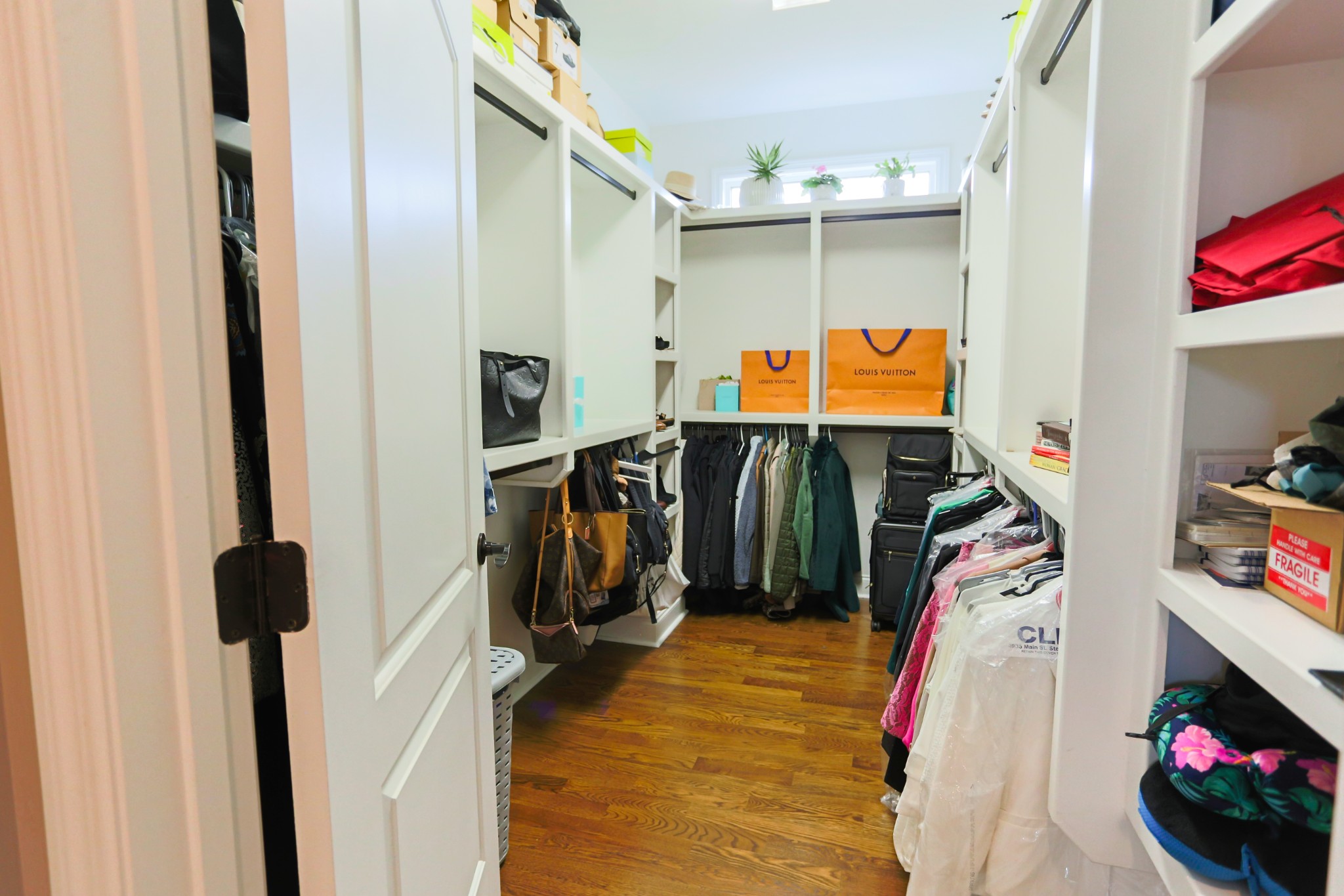 1700 Zevon Court Spring Hill, TN 37174 - Photo 30 of 71 a view of walk in closet with clothes and shoes