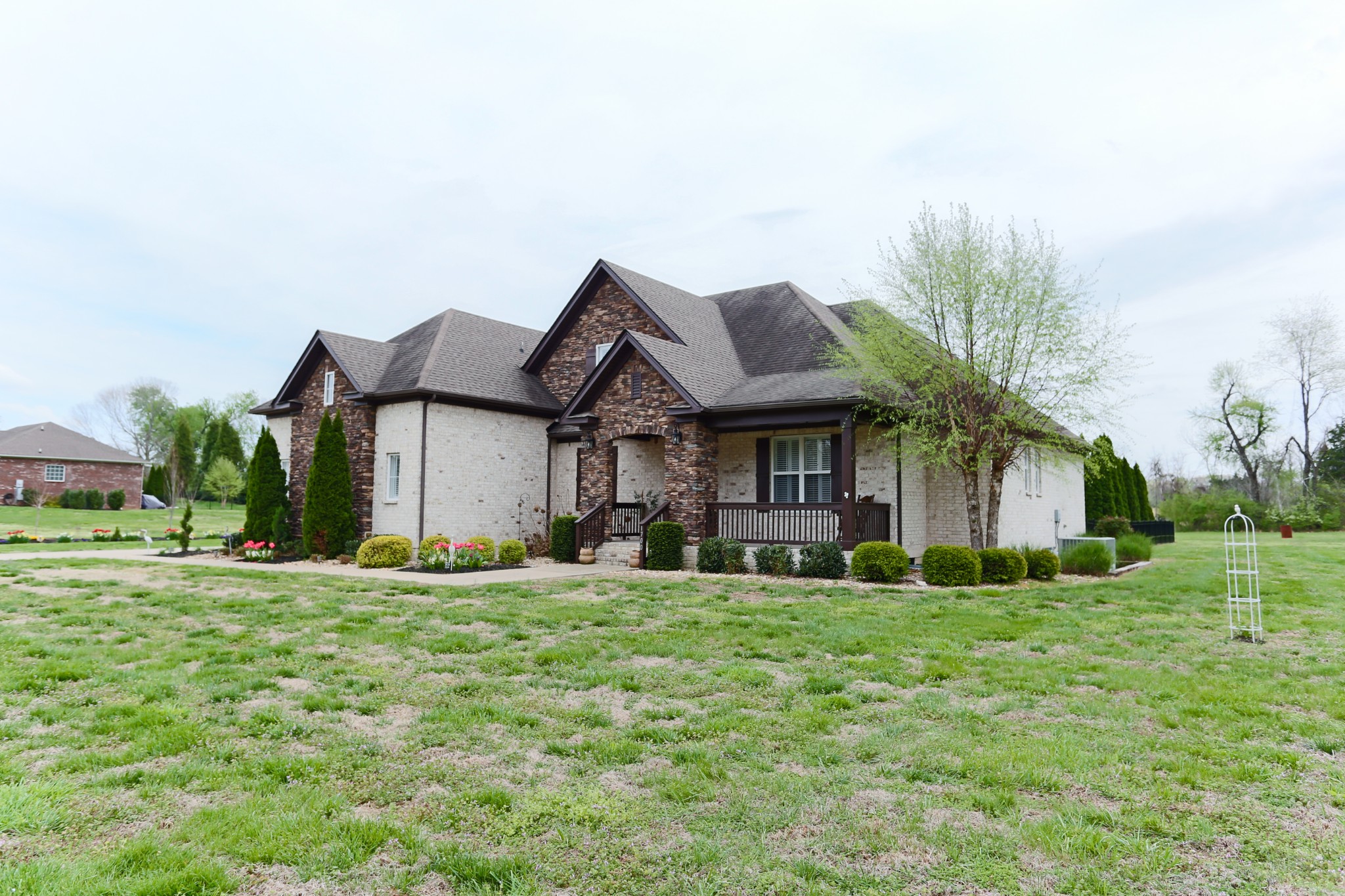 1700 Zevon Court Spring Hill, TN 37174 - Photo 3 of 71 a view of a house with a yard and sitting area