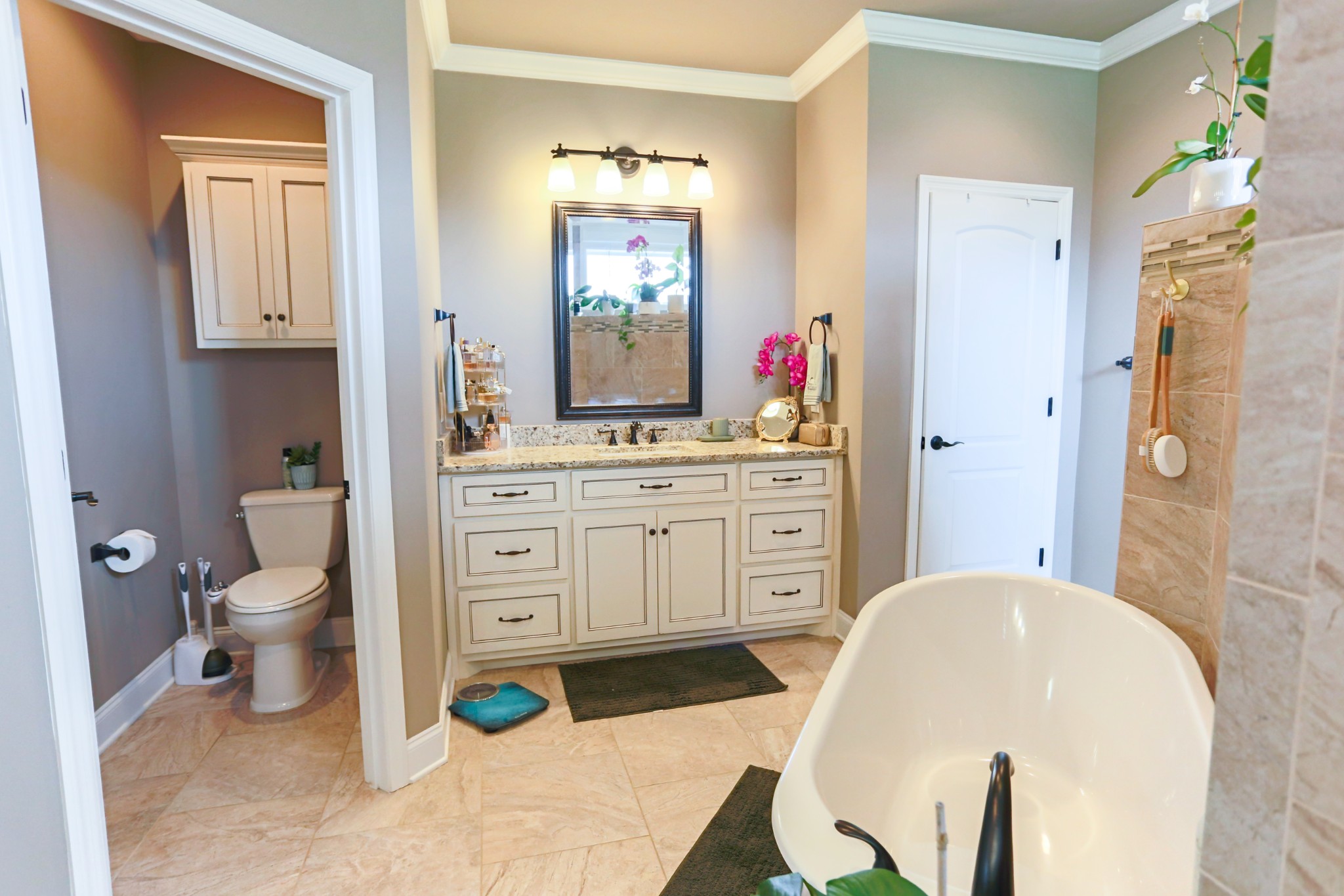 1700 Zevon Court Spring Hill, TN 37174 - Photo 33 of 71 a spacious bathroom with a sink a vanity and a mirror