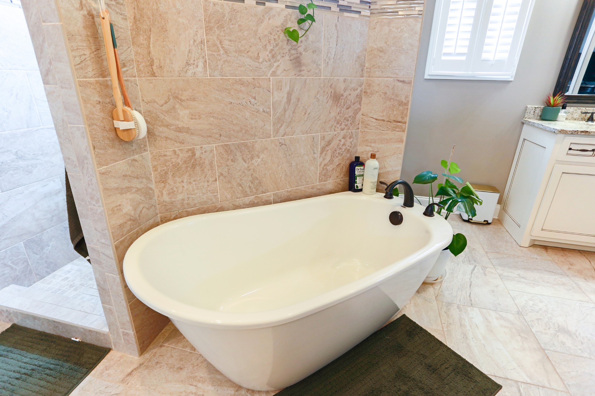 1700 Zevon Court Spring Hill, TN 37174 - Photo 36 of 71 a white bath tub sitting in a bathroom