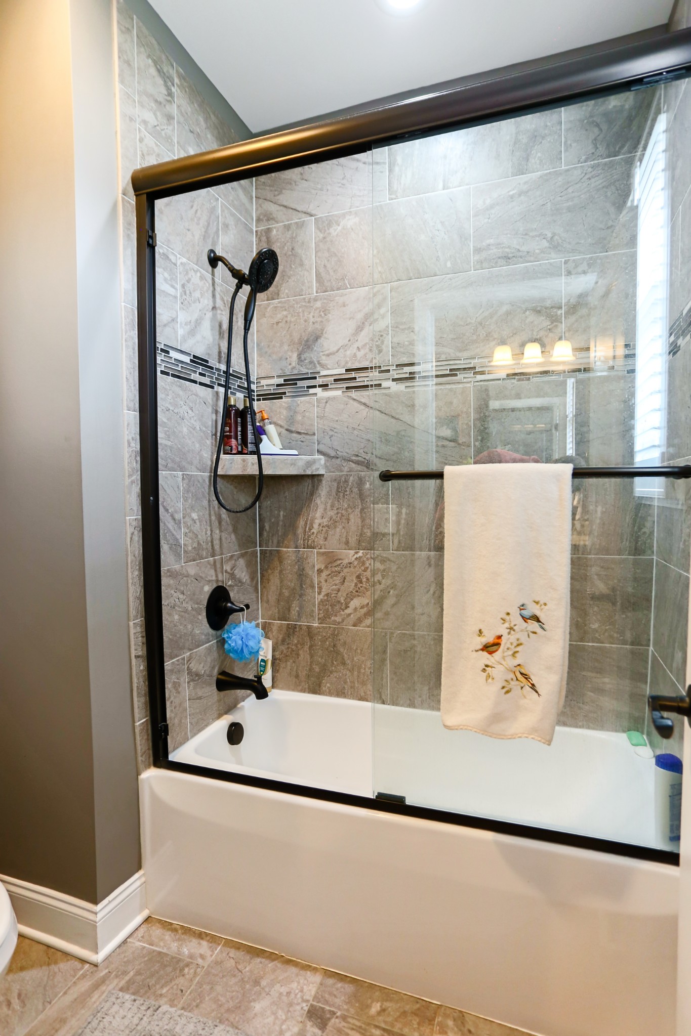 1700 Zevon Court Spring Hill, TN 37174 - Photo 41 of 71 a bathroom with a bathtub and a shower