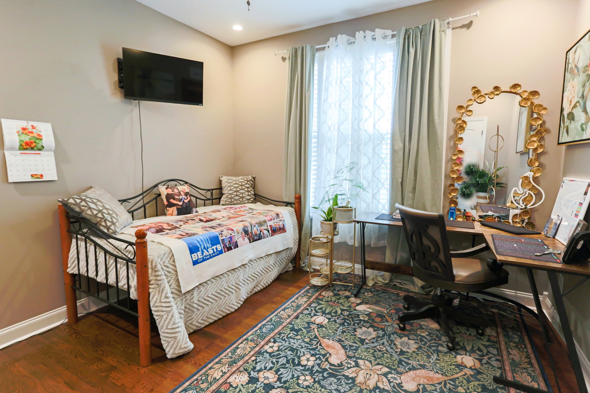 1700 Zevon Court Spring Hill, TN 37174 - Photo 43 of 71 a bedroom with a bed and large windows
