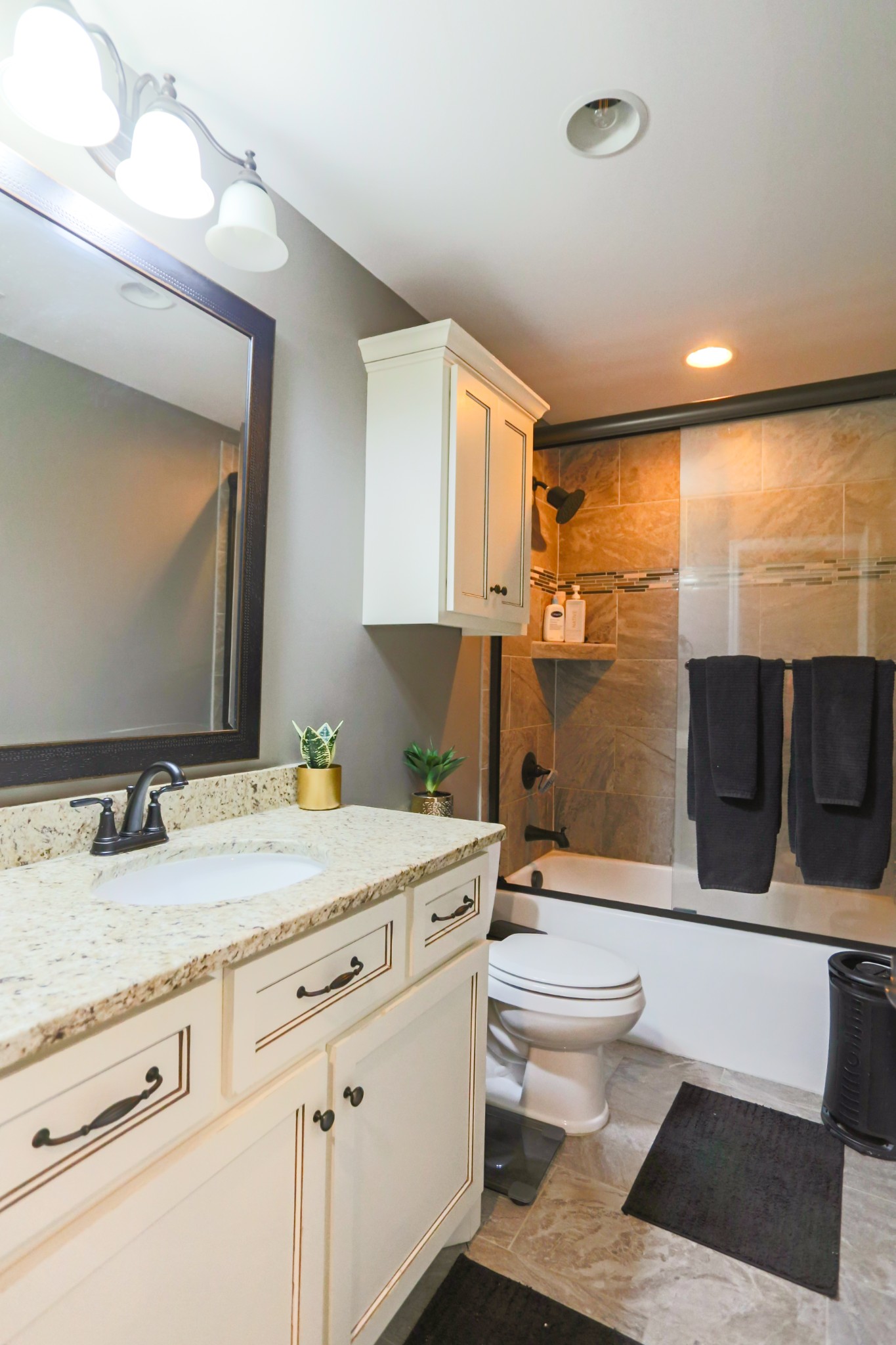 1700 Zevon Court Spring Hill, TN 37174 - Photo 45 of 71 a bathroom with a sink a toilet and shower