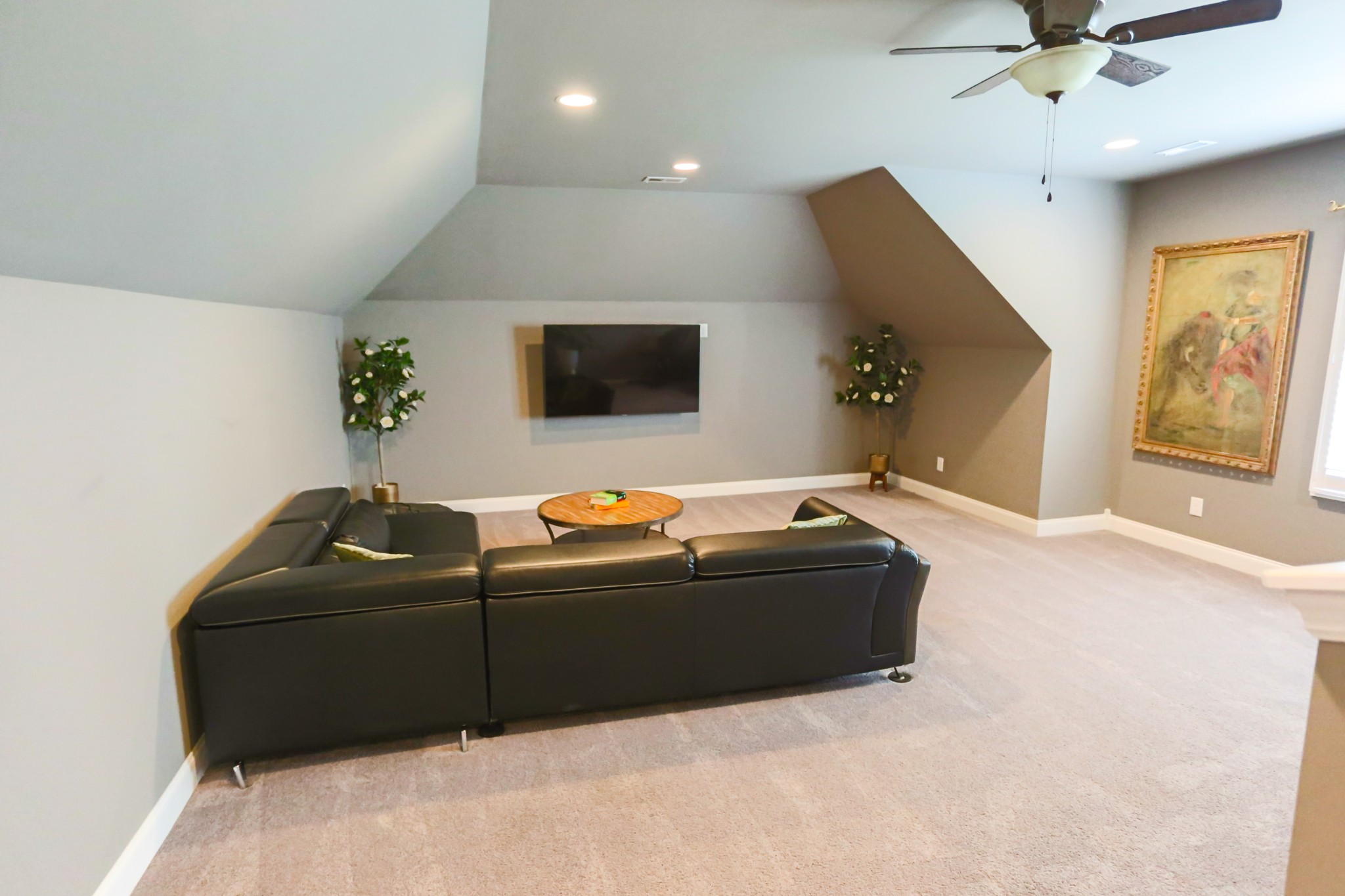 1700 Zevon Court Spring Hill, TN 37174 - Photo 49 of 71 a living room with furniture and a flat screen tv