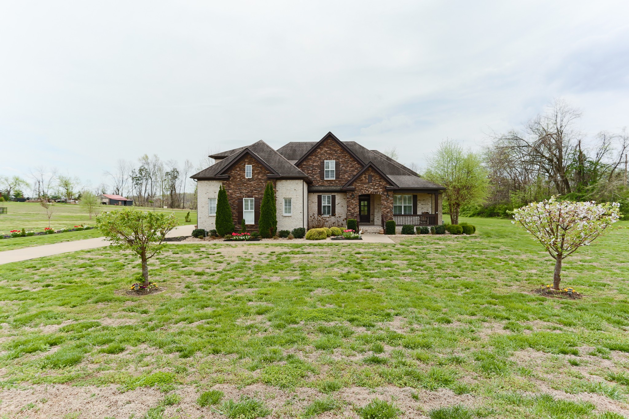 1700 Zevon Court Spring Hill, TN 37174 - Photo 6 of 71 a front view of a house with a yard