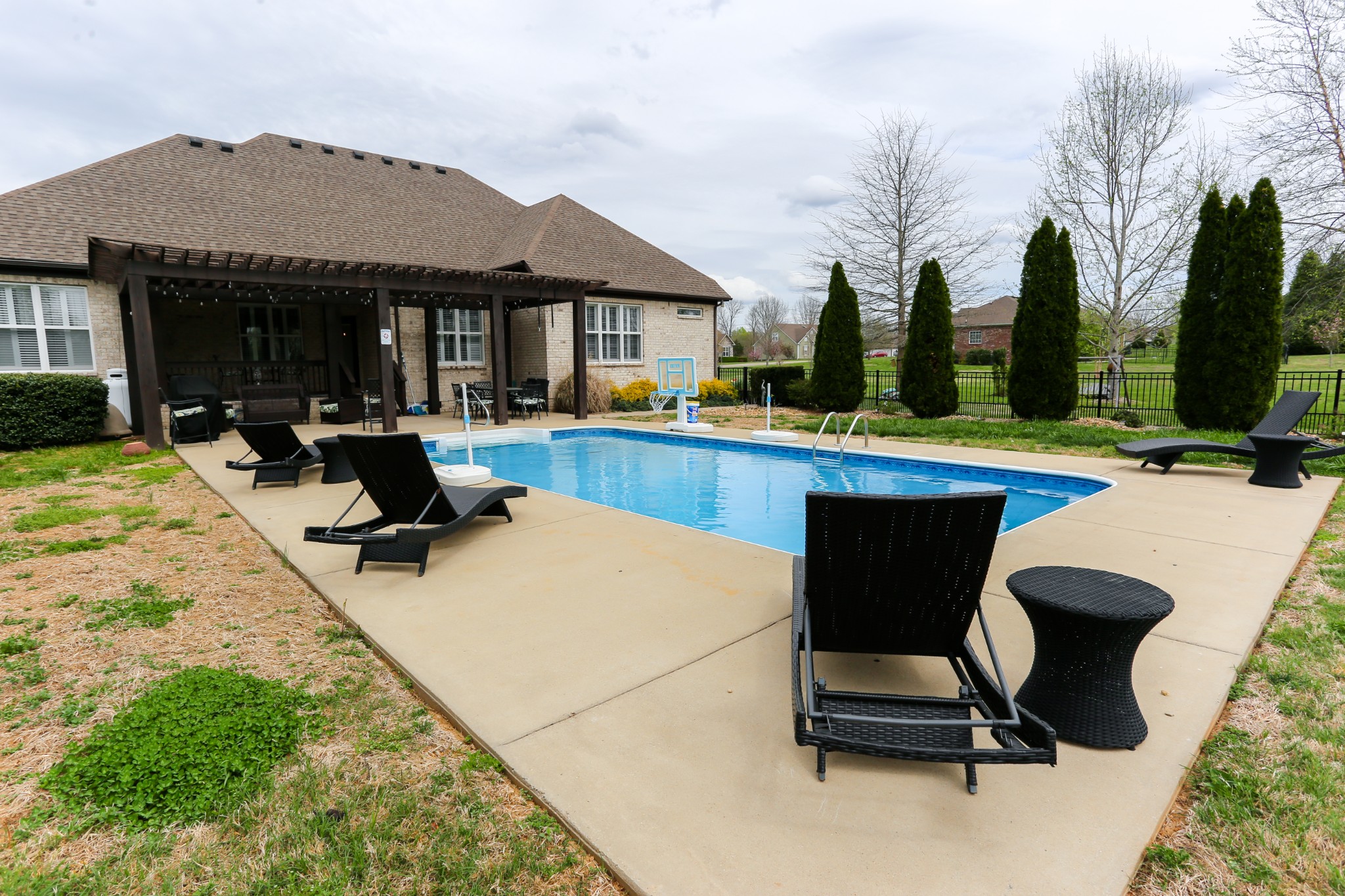 1700 Zevon Court Spring Hill, TN 37174 - Photo 61 of 71 a view of a house with swimming pool and sitting area