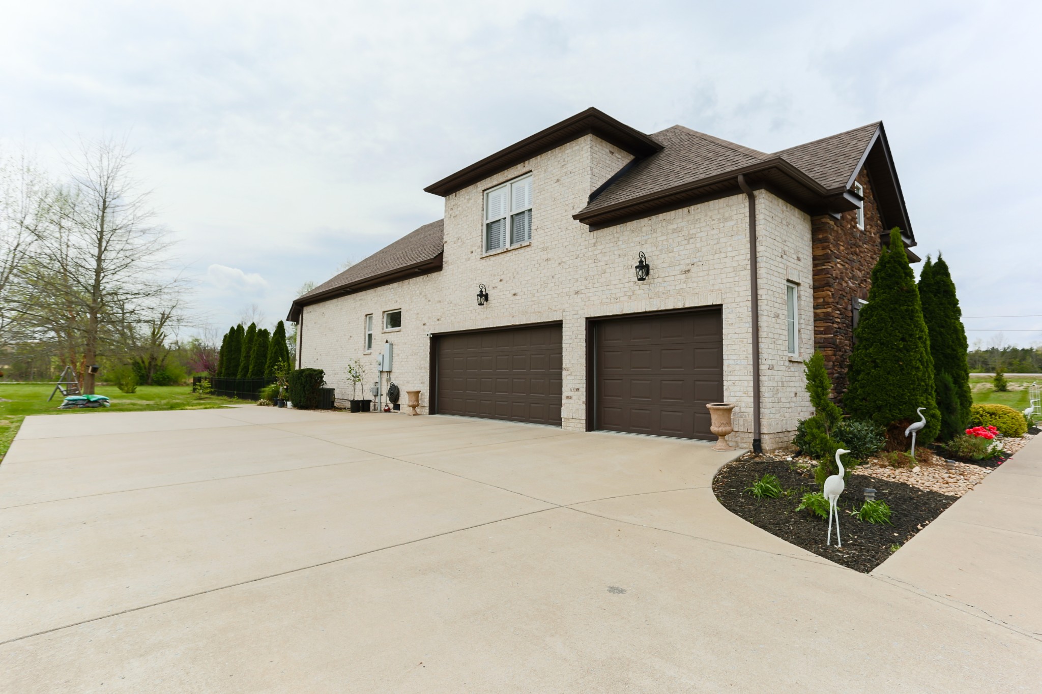 1700 Zevon Court Spring Hill, TN 37174 - Photo 8 of 71 a front view of a house with garage
