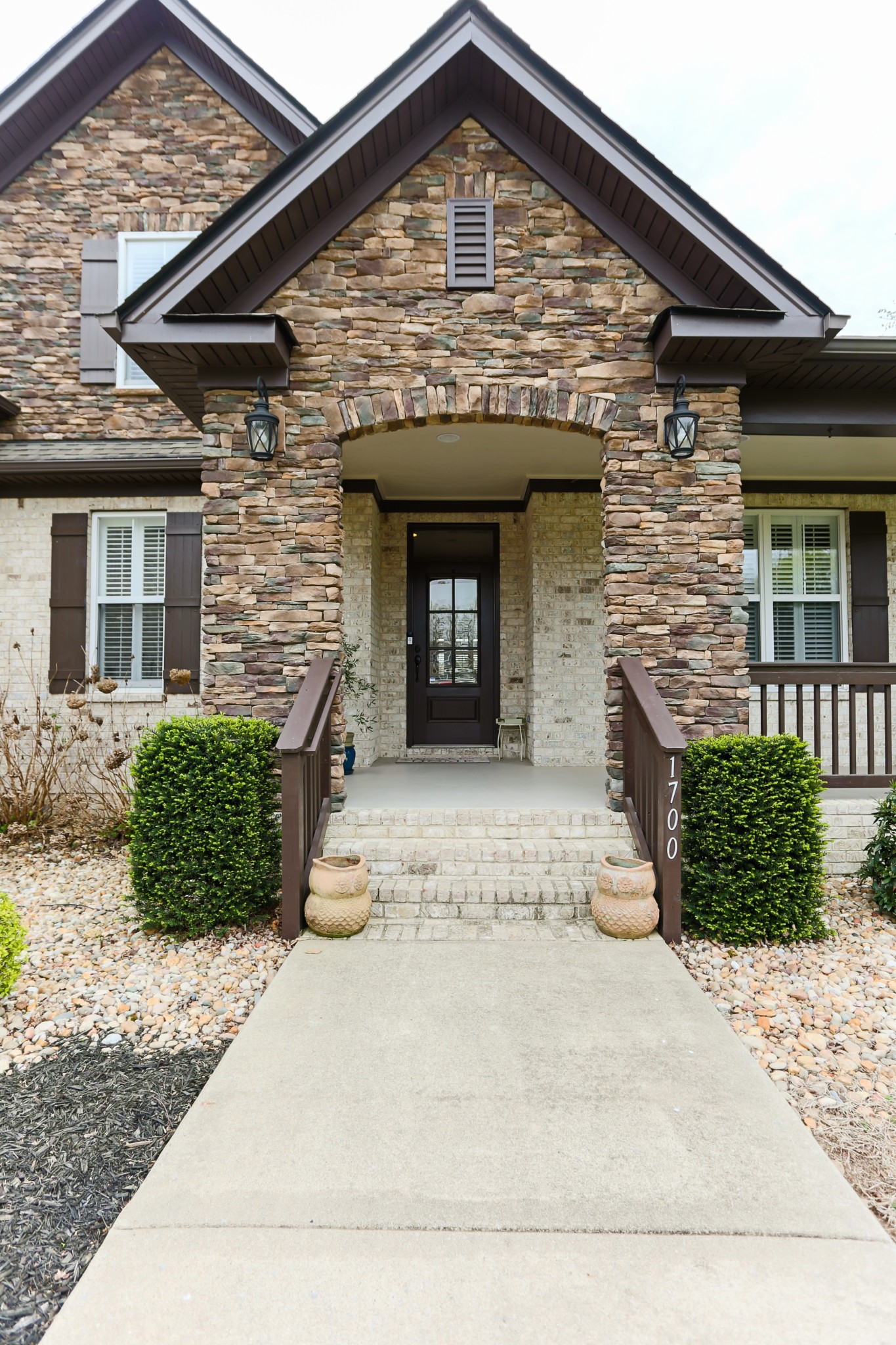 1700 Zevon Court Spring Hill, TN 37174 - Photo 10 of 71 a front view of a house with a yard