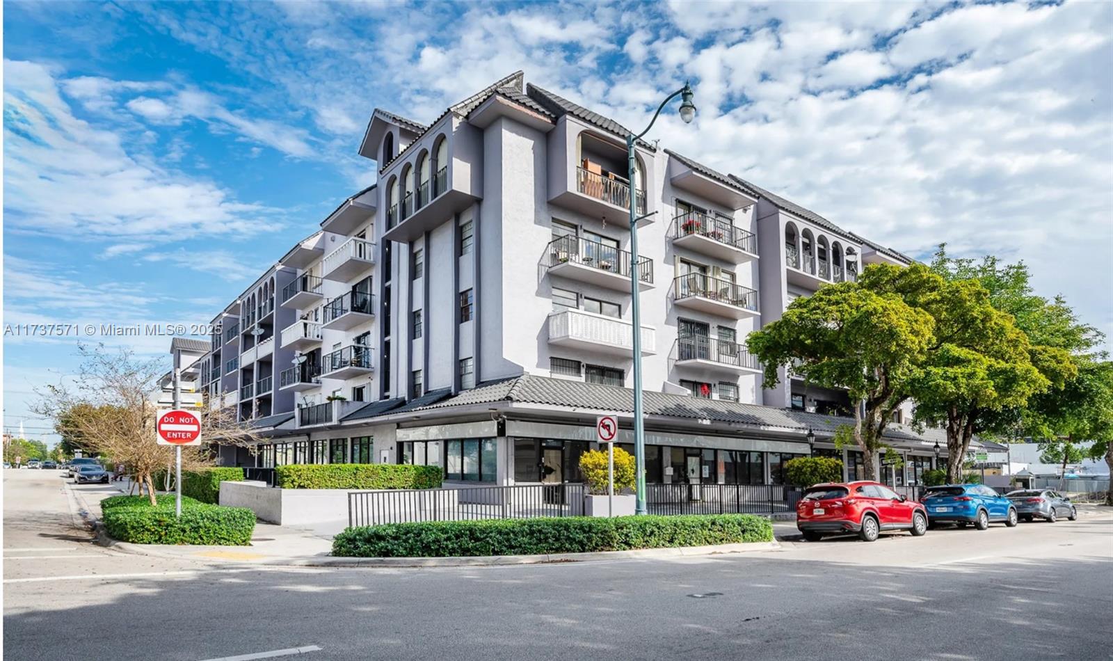 777 Southwest 9th Avenue, Unit 406 Miami, FL 33130 - Photo 1 of 11 a tall building sitting on the side of a street