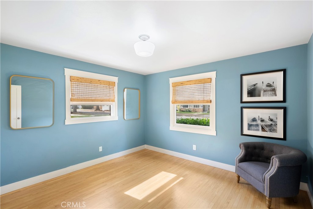 6736 Nicolett Street Riverside, CA 92504 - Photo 17 of 38 a bedroom with furniture and a window