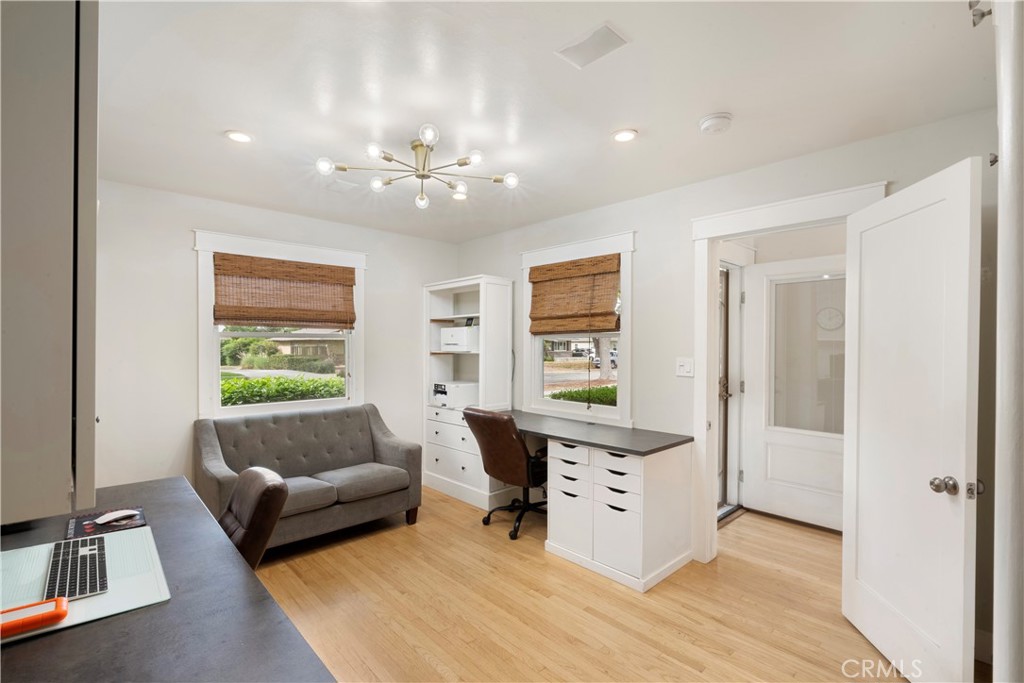 6736 Nicolett Street Riverside, CA 92504 - Photo 19 of 38 a living room with furniture and a window
