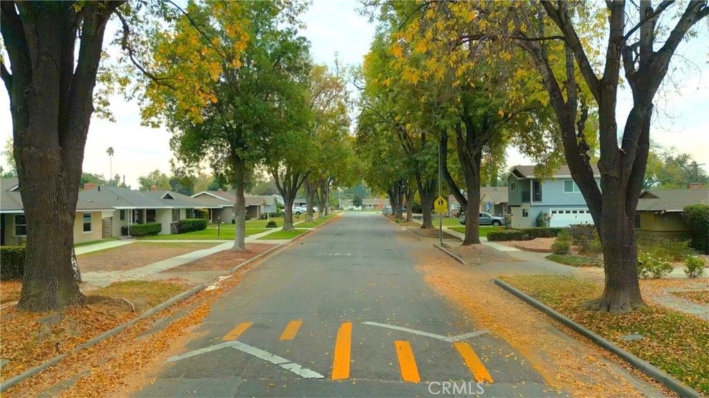 6736 Nicolett Street Riverside, CA 92504 - Photo 2 of 38 a view of a patio with a table and chairs next to a yard