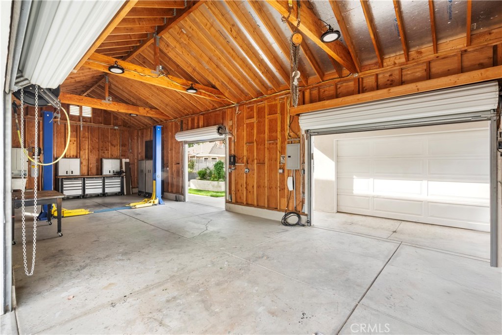 6736 Nicolett Street Riverside, CA 92504 - Photo 33 of 38 a view of empty room with wooden floor and door