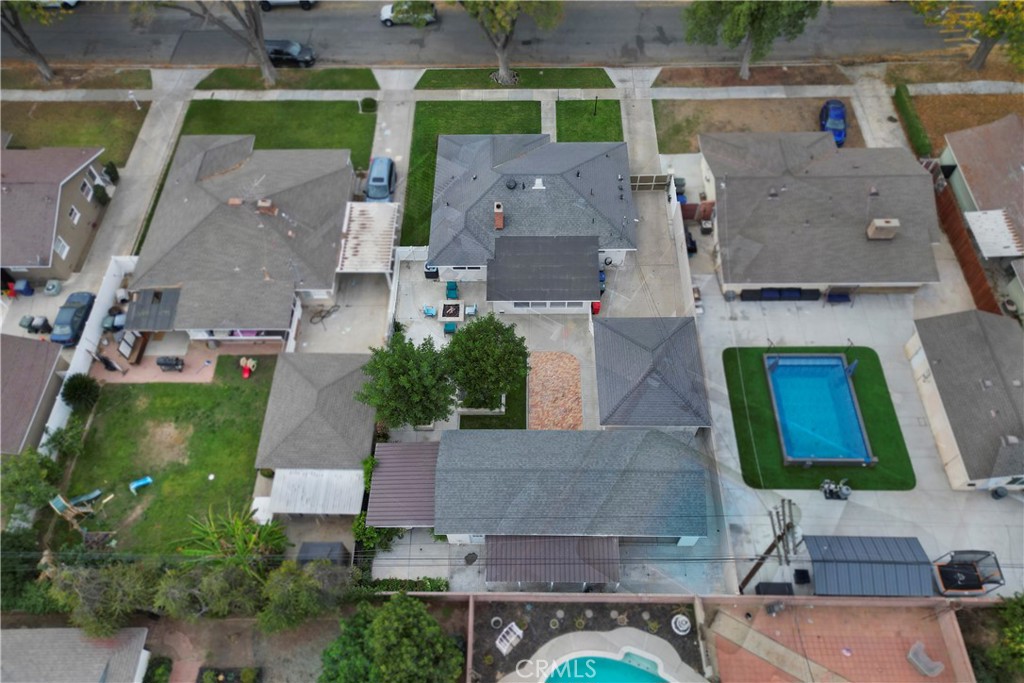 6736 Nicolett Street Riverside, CA 92504 - Photo 37 of 38 an aerial view of multiple houses with outdoor space