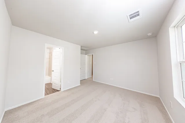 an empty room with a natural light