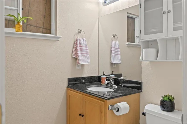 a bathroom with a shower and a bath tub