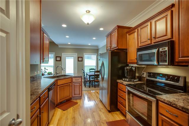1939 Rock Springs Road Columbia, TN 38401 - Photo 5 of 19 This great kitchen has plenty of cabinets, hardwood floors and recessed lighting.