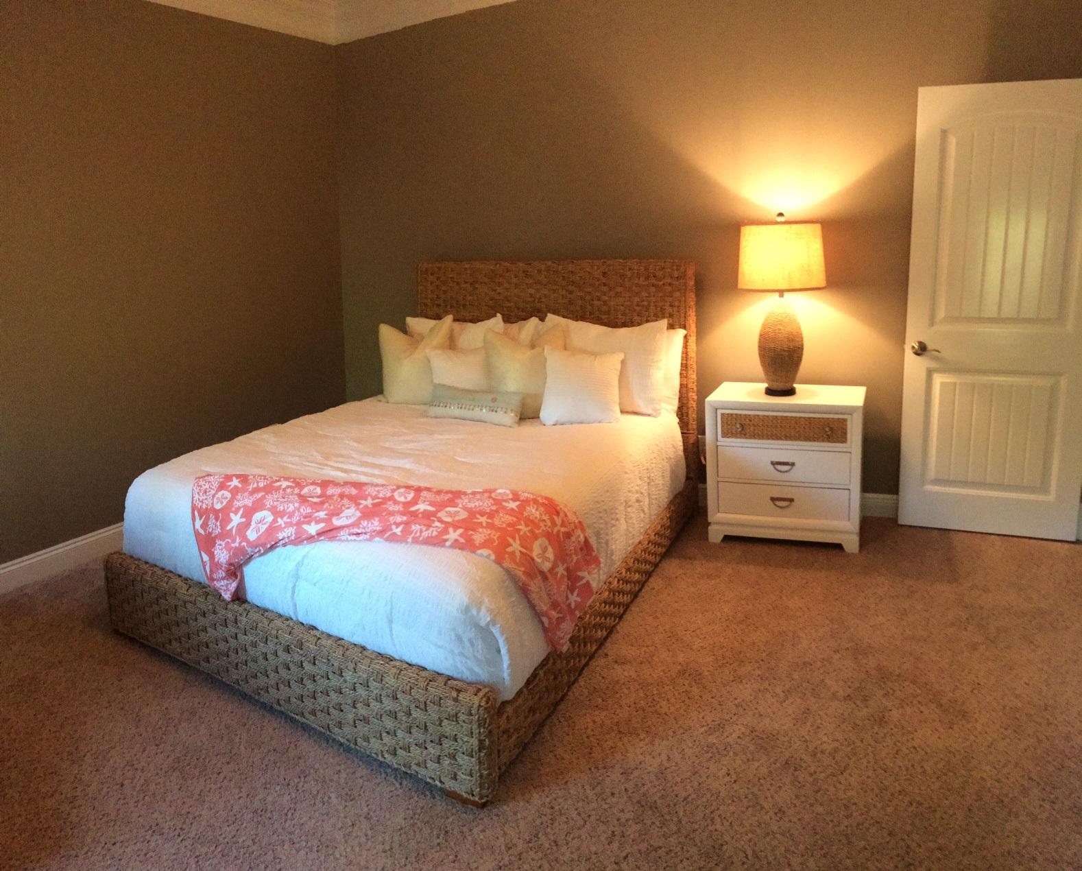 35 The Greenway Loop Inlet Beach, FL 32461 - Photo 18 of 37 a bedroom with a bed and a lamp