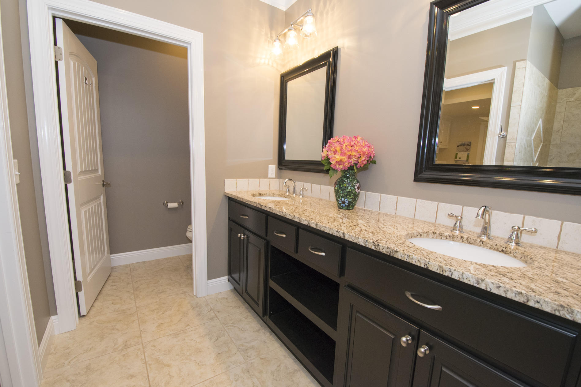 35 The Greenway Loop Inlet Beach, FL 32461 - Photo 20 of 37 a bathroom with a granite countertop sink double vanity and a mirror