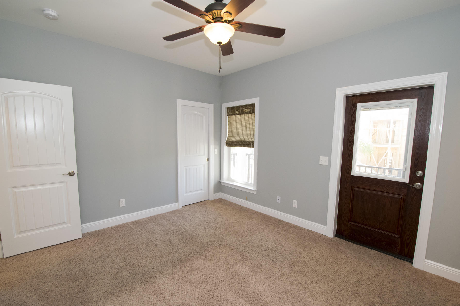 35 The Greenway Loop Inlet Beach, FL 32461 - Photo 23 of 37 an empty room with closet and windows
