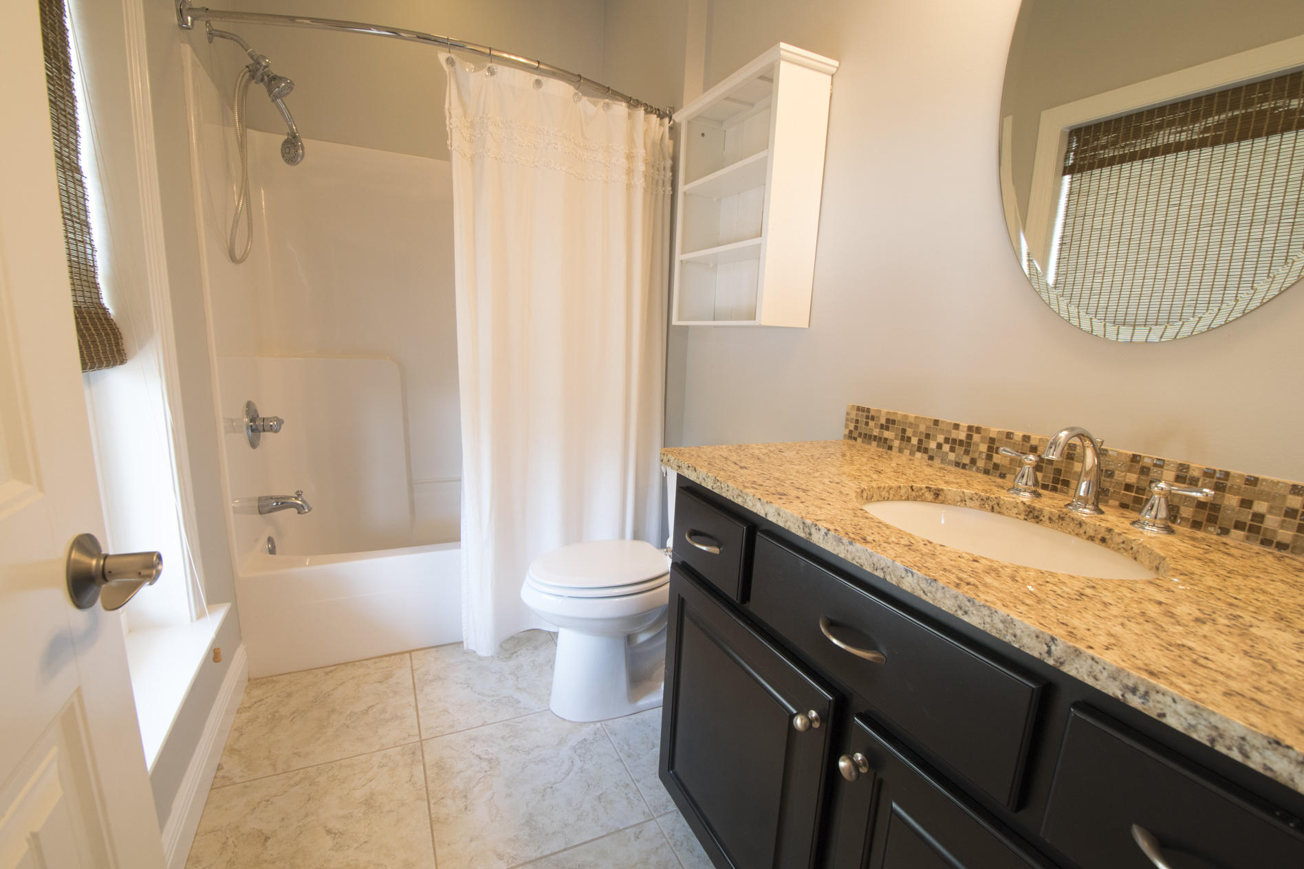 35 The Greenway Loop Inlet Beach, FL 32461 - Photo 24 of 37 a bathroom with a granite countertop sink a toilet and shower
