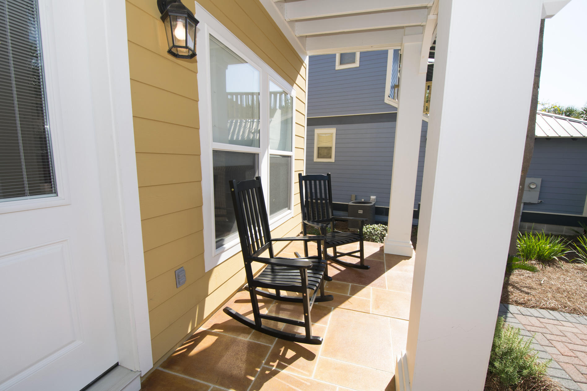 35 The Greenway Loop Inlet Beach, FL 32461 - Photo 3 of 37 a view of a balcony with chairs and a stove