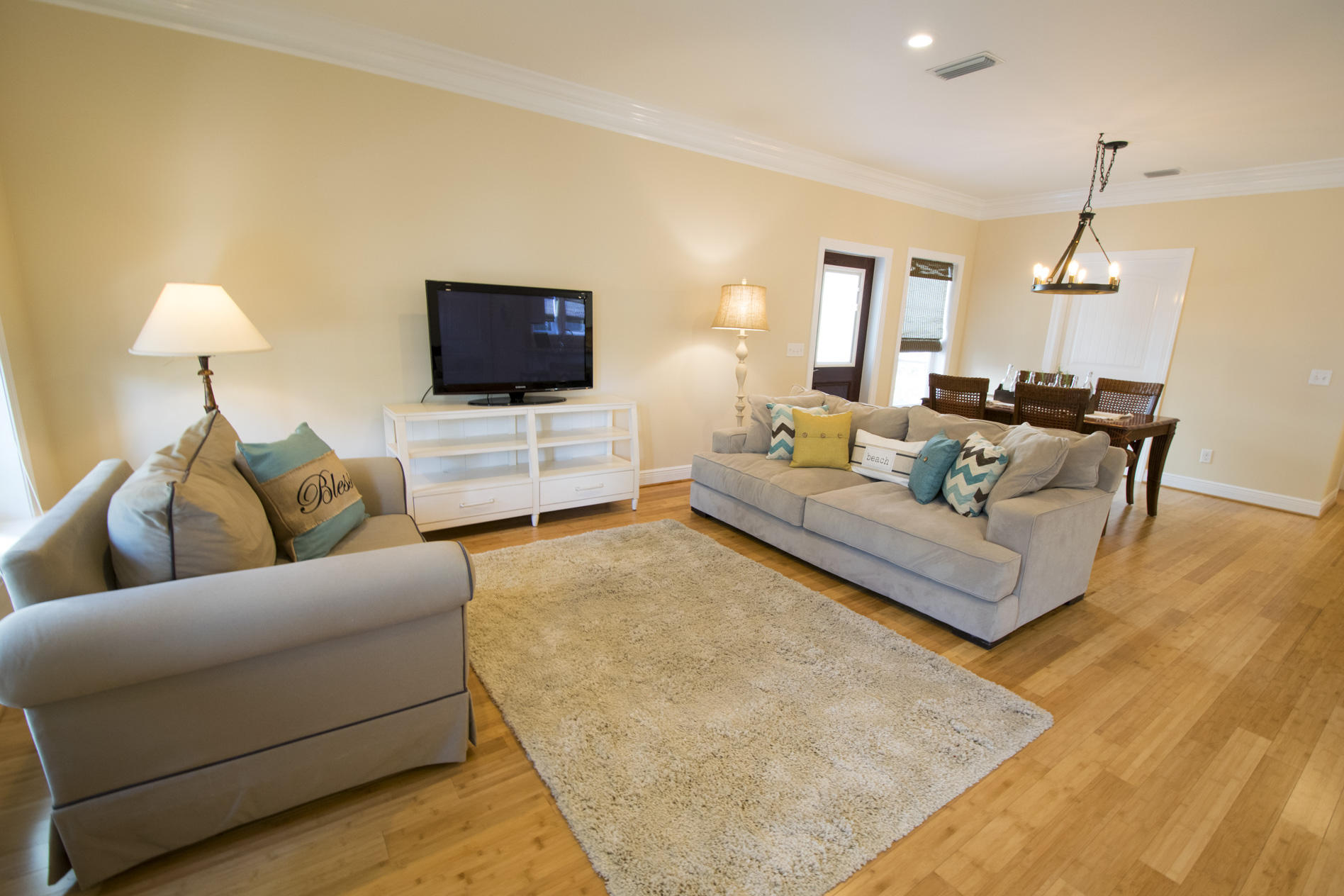 35 The Greenway Loop Inlet Beach, FL 32461 - Photo 6 of 37 a living room with furniture and a flat screen tv