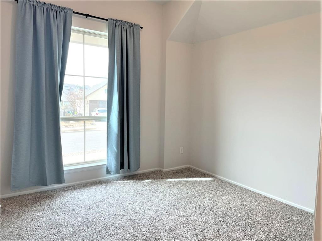 156 Santa Maria Street Georgetown, TX 78628 - Photo 19 of 40 Carpeted spare room with baseboards