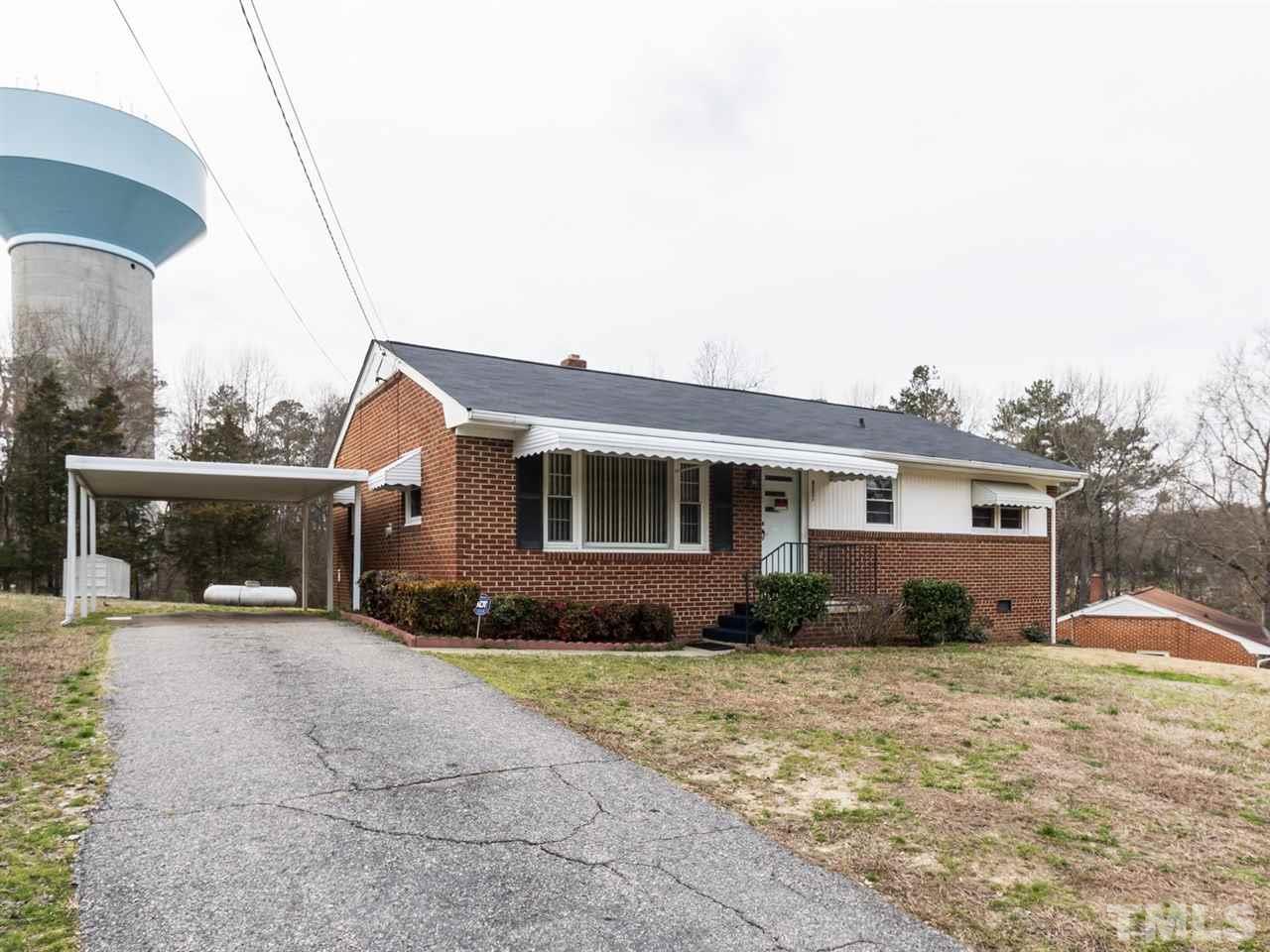 4321 James Road Raleigh, NC 27616 - Photo 1 of 23 a front view of a house with a yard