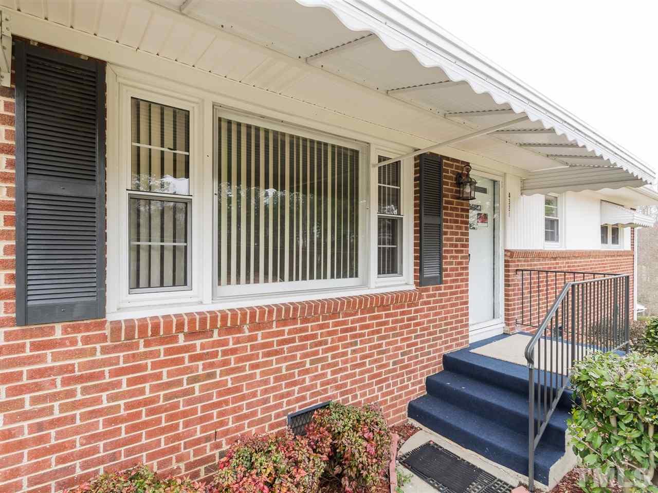 4321 James Road Raleigh, NC 27616 - Photo 2 of 23 a view of a brick house with stairs