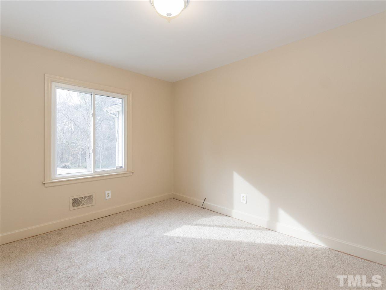 4321 James Road Raleigh, NC 27616 - Photo 16 of 23 an empty room with a window