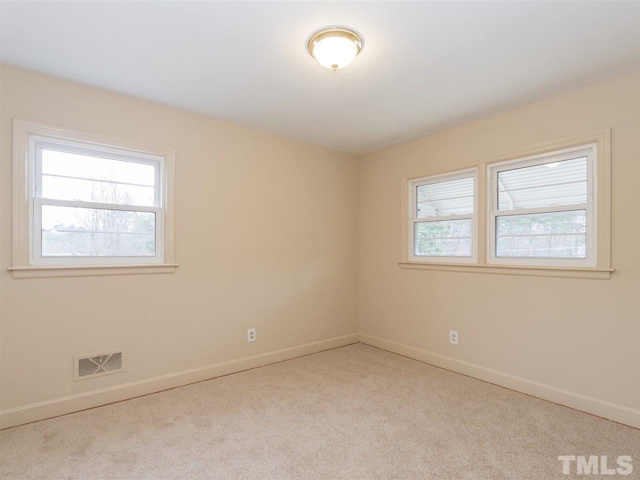 4321 James Road Raleigh, NC 27616 - Photo 18 of 23 an empty room with windows